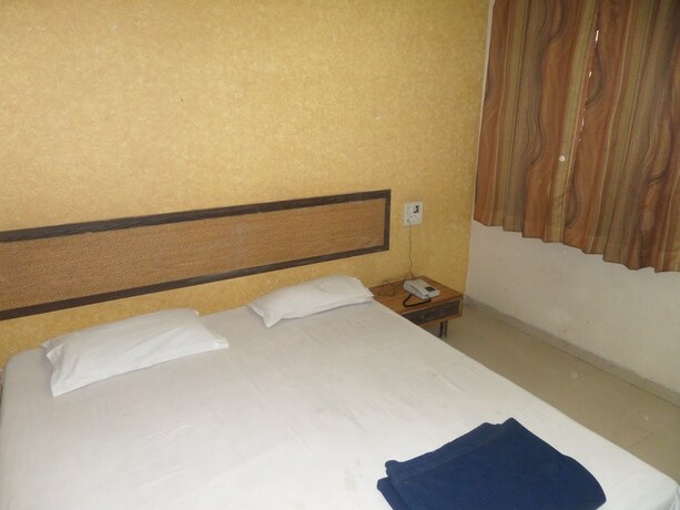Imagen de la habitación del Hotel Tourist Home Lodging. Foto 22