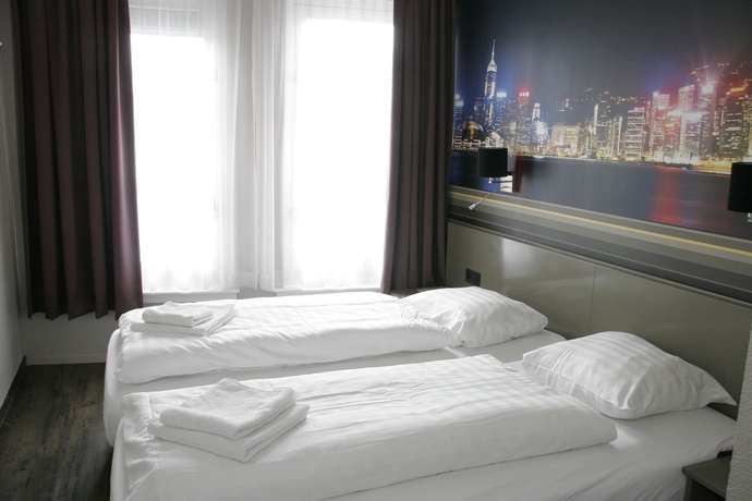 Imagen de la habitación del Hotel Tourist Inn Budget - Hostel. Foto 14