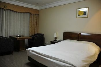 Imagen de la habitación del Hotel Tourist Masters. Foto 16