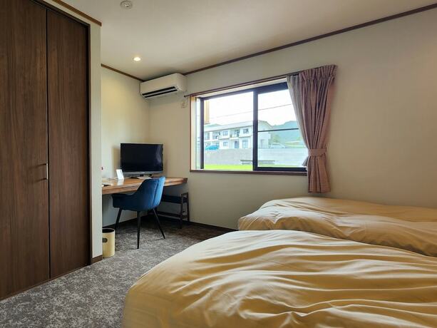 Imagen de la habitación del Hotel Tourist Minowa. Foto 34