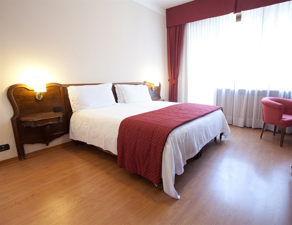 Imagen de la habitación del Hotel Tourist, Turín. Foto 7