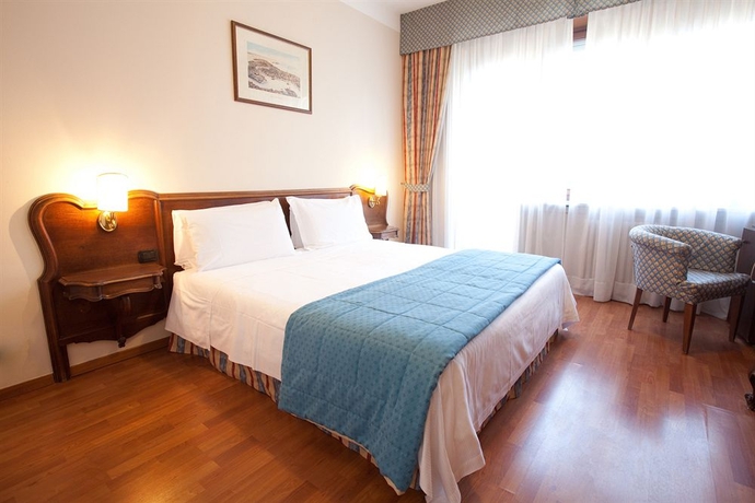 Imagen de la habitación del Hotel Tourist, Turín. Foto 8