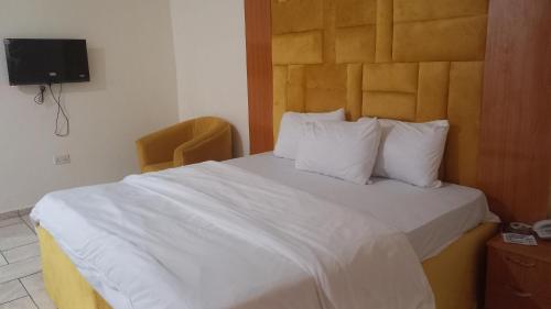 Imagen de la habitación del Hotel Tovia and Suite Limited. Foto 20