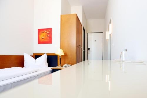 Imagen de la habitación del Hotel Tow. Foto 8