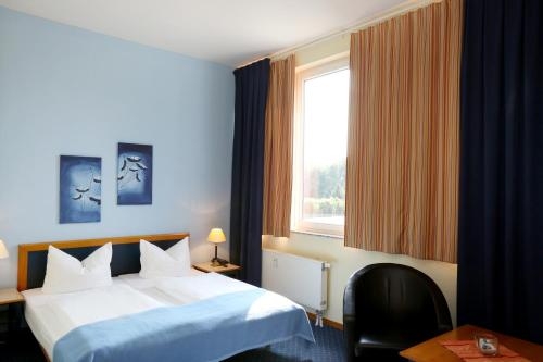 Imagen de la habitación del Hotel Tow. Foto 9