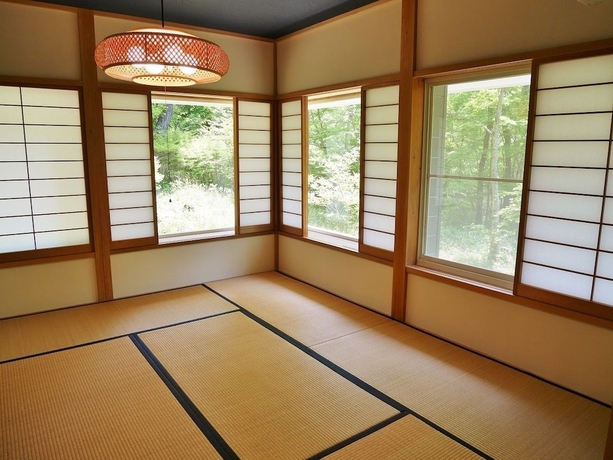 Imagen de la habitación del Hotel Towa Pure Cottages. Foto 5