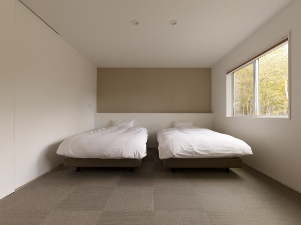 Imagen de la habitación del Hotel Towa Pure Cottages. Foto 7