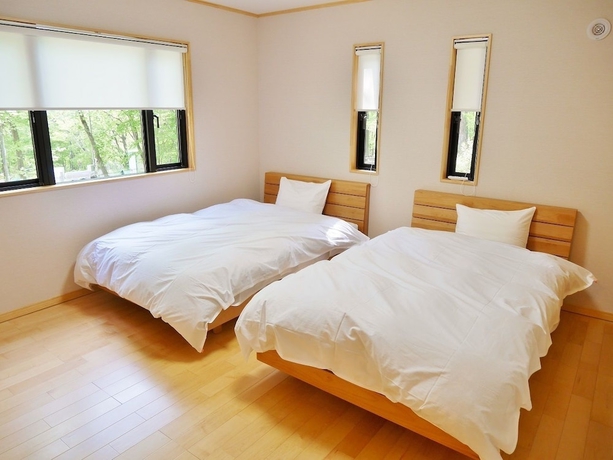 Imagen de la habitación del Hotel Towa Pure Cottages. Foto 9