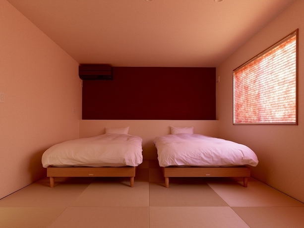 Imagen de la habitación del Hotel Towa Pure Cottages. Foto 15