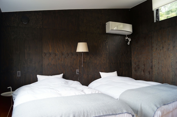 Imagen de la habitación del Hotel Towa Pure Cottages. Foto 19