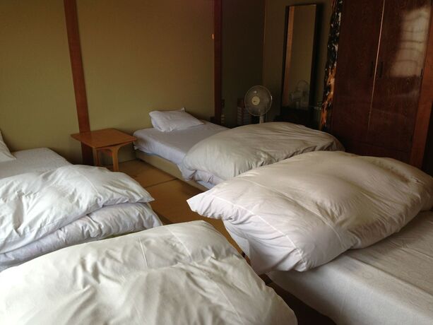 Imagen de la habitación del Hotel Towadako Backpackers. Foto 17