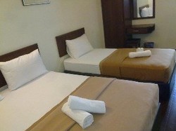 Imagen de la habitación del Hotel Tower Budget Hotel. Foto 11