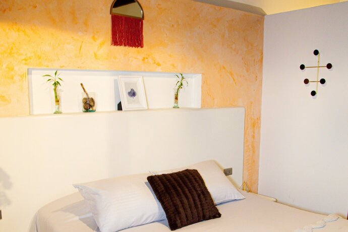 Imagen de la habitación del Hotel Town House Jiwa in Provenza. Foto 13
