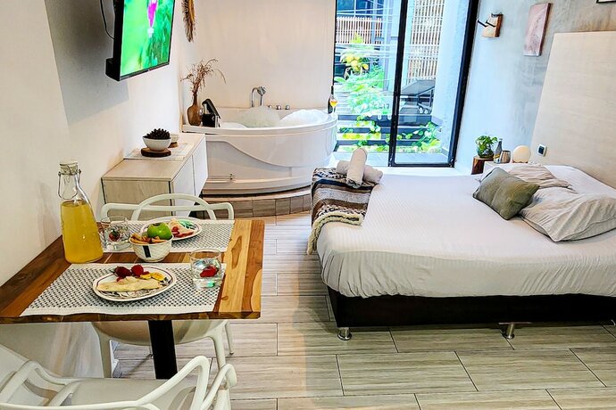 Imagen de la habitación del Hotel Town House Jiwa in Provenza. Foto 15