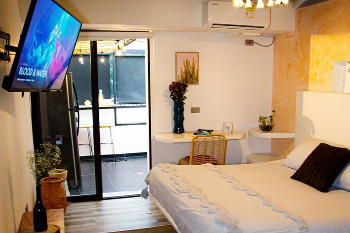 Imagen de la habitación del Hotel Town House Jiwa in Provenza. Foto 16
