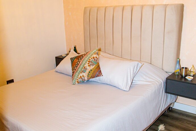 Imagen de la habitación del Hotel Town House Jiwa in Provenza. Foto 17