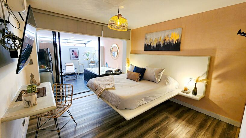 Imagen de la habitación del Hotel Town House Jiwa in Provenza. Foto 19