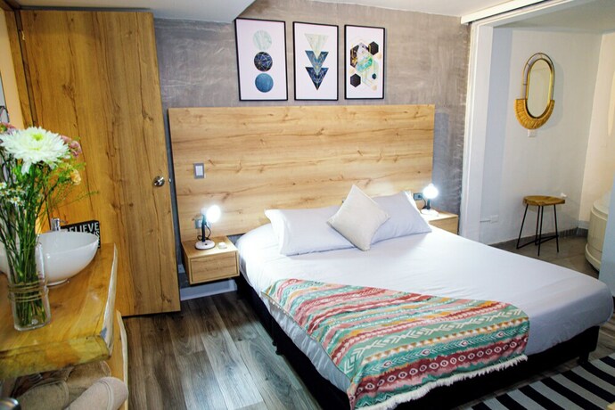 Imagen de la habitación del Hotel Town House Jiwa in Provenza. Foto 20