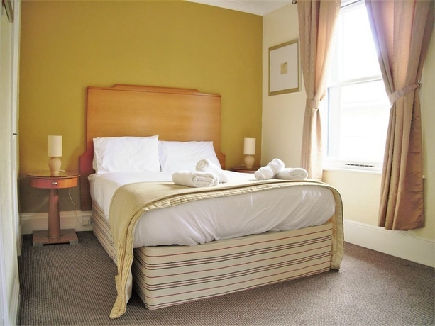 Imagen de la habitación del Hotel Town House Rooms. Foto 4
