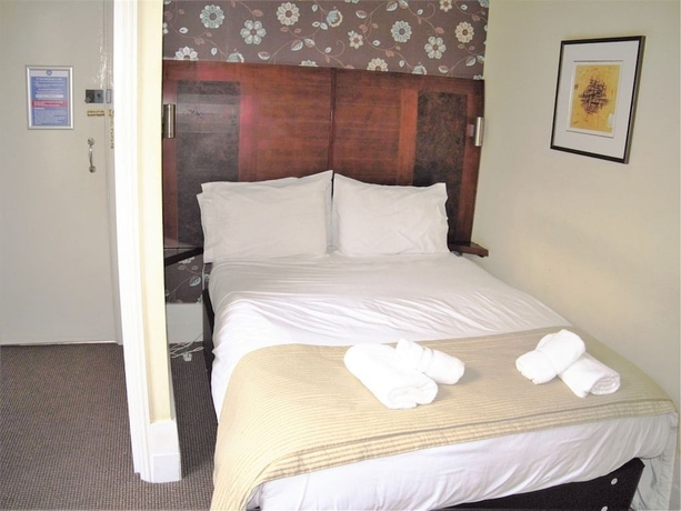 Imagen de la habitación del Hotel Town House Rooms. Foto 5
