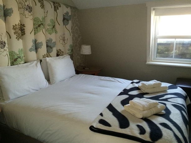 Imagen de la habitación del Hotel Town House Rooms. Foto 6