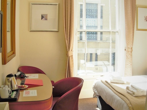Imagen de la habitación del Hotel Town House Rooms. Foto 8