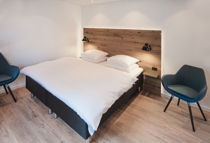 Imagen de la habitación del Hotel Town Living. Foto 4
