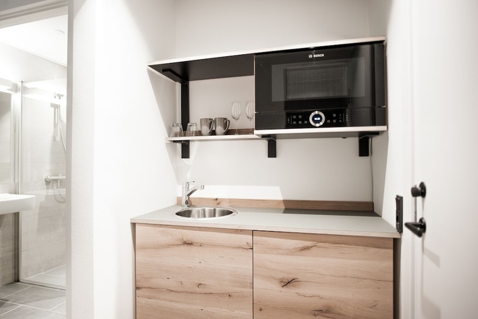 Imagen de la habitación del Hotel Town Living. Foto 10