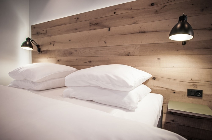 Imagen de la habitación del Hotel Town Living. Foto 11