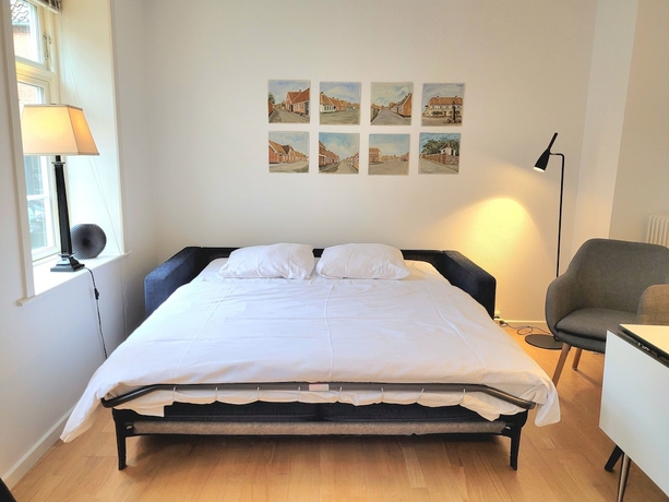 Imagen de la habitación del Hotel Town Living. Foto 16