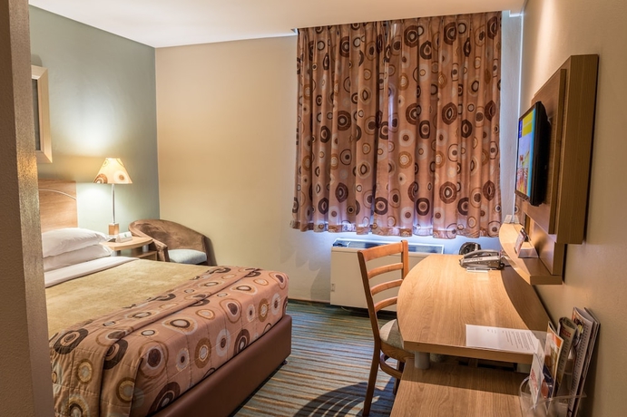 Imagen de la habitación del Hotel Town Lodge Roodepoort. Foto 8