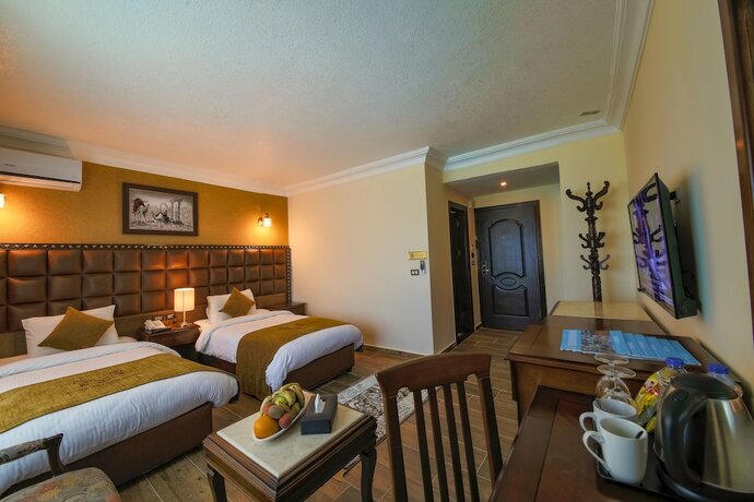 Imagen de la habitación del Hotel Town Season. Foto 15
