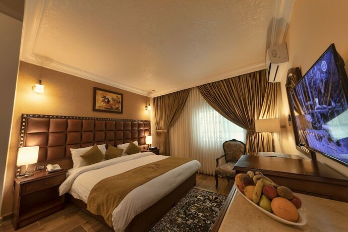 Imagen de la habitación del Hotel Town Season. Foto 16