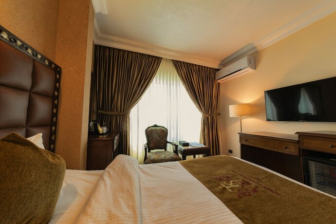 Imagen de la habitación del Hotel Town Season. Foto 17
