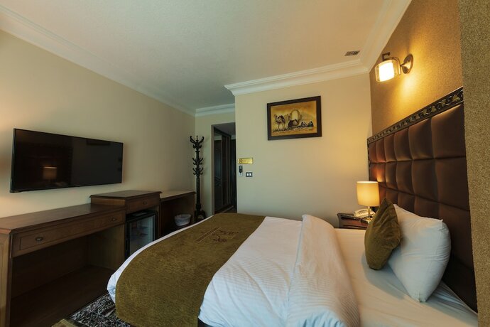 Imagen de la habitación del Hotel Town Season. Foto 18
