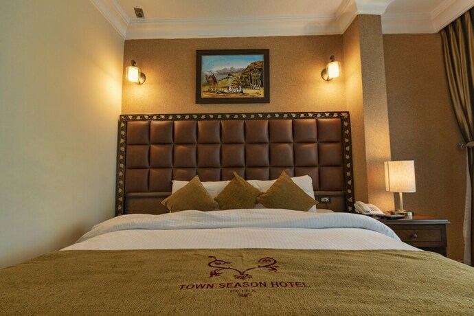 Imagen de la habitación del Hotel Town Season. Foto 19