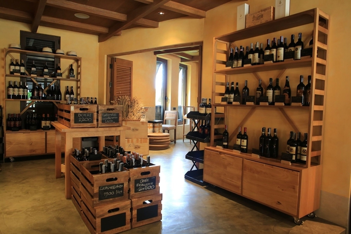Imagen del bar/restaurante del Hotel Town Square Suites By Toscana Valley. Foto 4