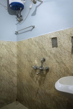 Imagen de la habitación del Hotel Town and Country inn, Dispur. Foto 19