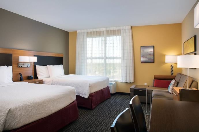 Imagen de la habitación del Hotel TownePlace Suites Orlando at FLAMINGO CROSSINGS® Town Center/Western Entrance. Foto 4