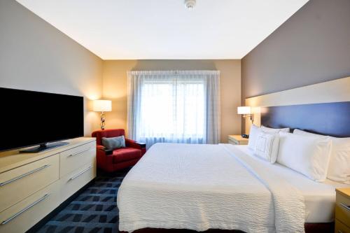 Imagen de la habitación del Hotel Towneplace Suites By Marriott Dallas Lewisville. Foto 17