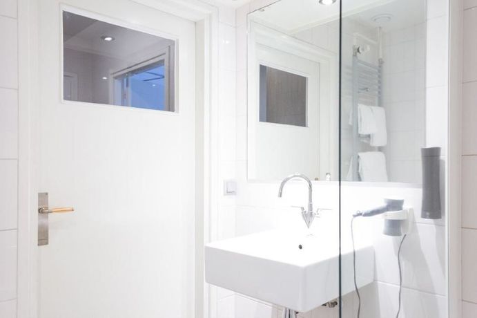 Imagen de la habitación del Hotel Townhouse Apartments. Foto 8