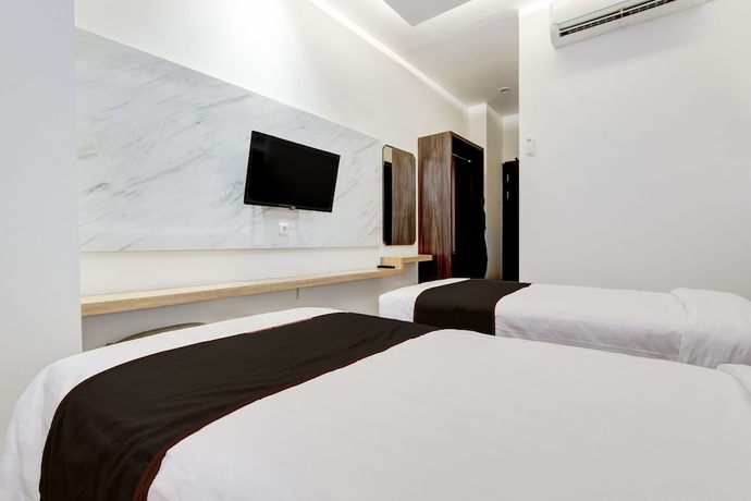 Imagen de la habitación del Hotel Townhouse OAK Near The Park Mall Semarang Formerly Semarang Boutique. Foto 7