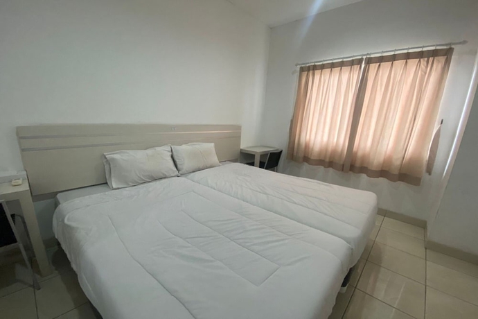 Imagen de la habitación del Hotel Townhouse OAK TOS Residence Tangerang. Foto 2