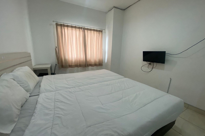 Imagen de la habitación del Hotel Townhouse OAK TOS Residence Tangerang. Foto 3