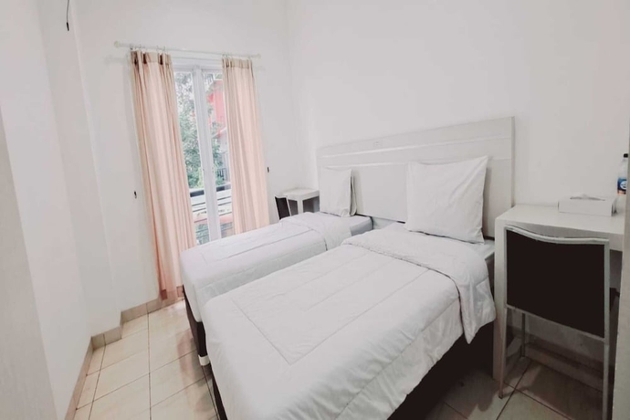 Imagen de la habitación del Hotel Townhouse OAK TOS Residence Tangerang. Foto 6
