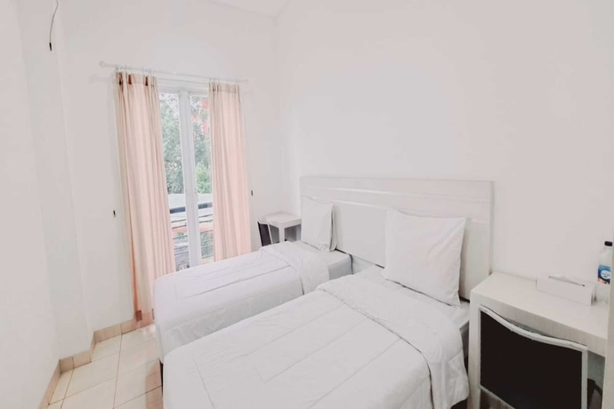 Imagen de la habitación del Hotel Townhouse OAK TOS Residence Tangerang. Foto 10