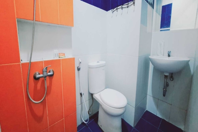 Imagen de la habitación del Hotel Townhouse OAK TOS Residence Tangerang. Foto 12