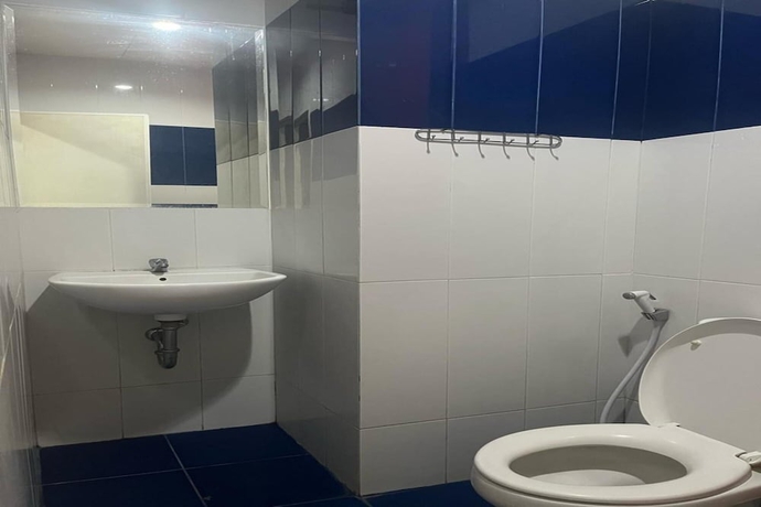 Imagen de la habitación del Hotel Townhouse OAK TOS Residence Tangerang. Foto 15