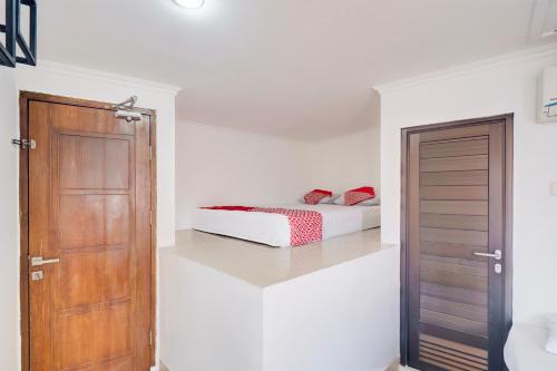 Imagen de la habitación del Hotel Townhouse Oak Ancol. Foto 20