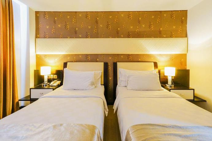 Imagen de la habitación del Hotel Townhouse Oak Denpasar at Mahendradatta. Foto 11